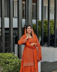 Designer kurti and flared palazzo set in orange color with heavy sequins and zari Embroidery work