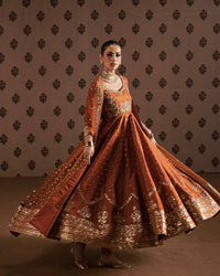 Party Wear Rangoli Silk Anarkali Gown in Rusty Orange