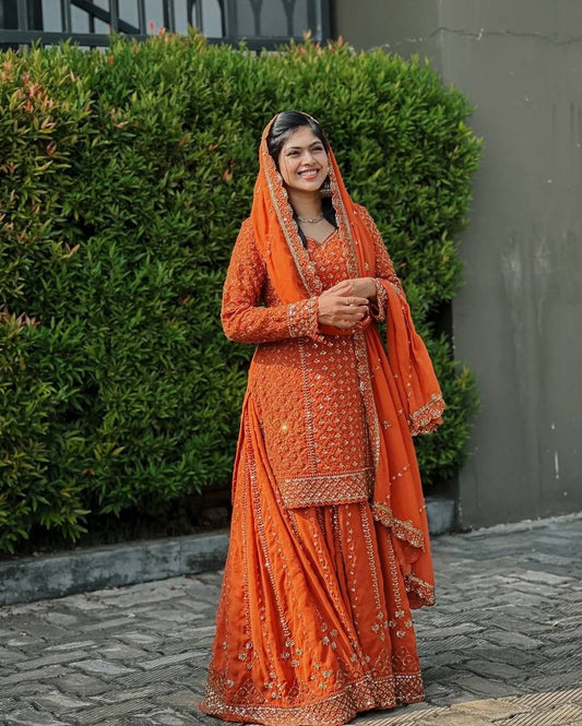 Designer kurti and flared palazzo set in orange color with heavy sequins and zari Embroidery work