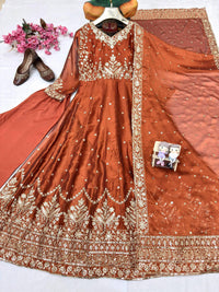 Party Wear Rangoli Silk Anarkali Gown in Rusty Orange