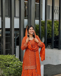 Designer kurti and flared palazzo set in orange color with heavy sequins and zari Embroidery work